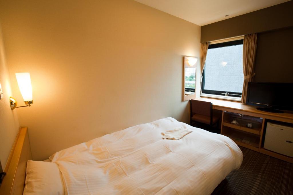Hotel Harmonie Cinq Kitakyūshū Zimmer foto